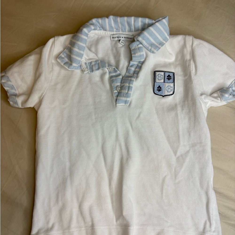 White Polo Shirt with Blue Striped Collar